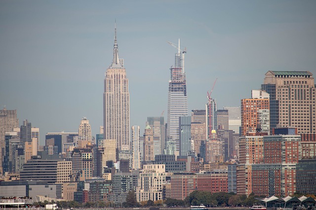 New York City skyline, a top New York tourist attraction. The Empire State Building, New York's top attraction.